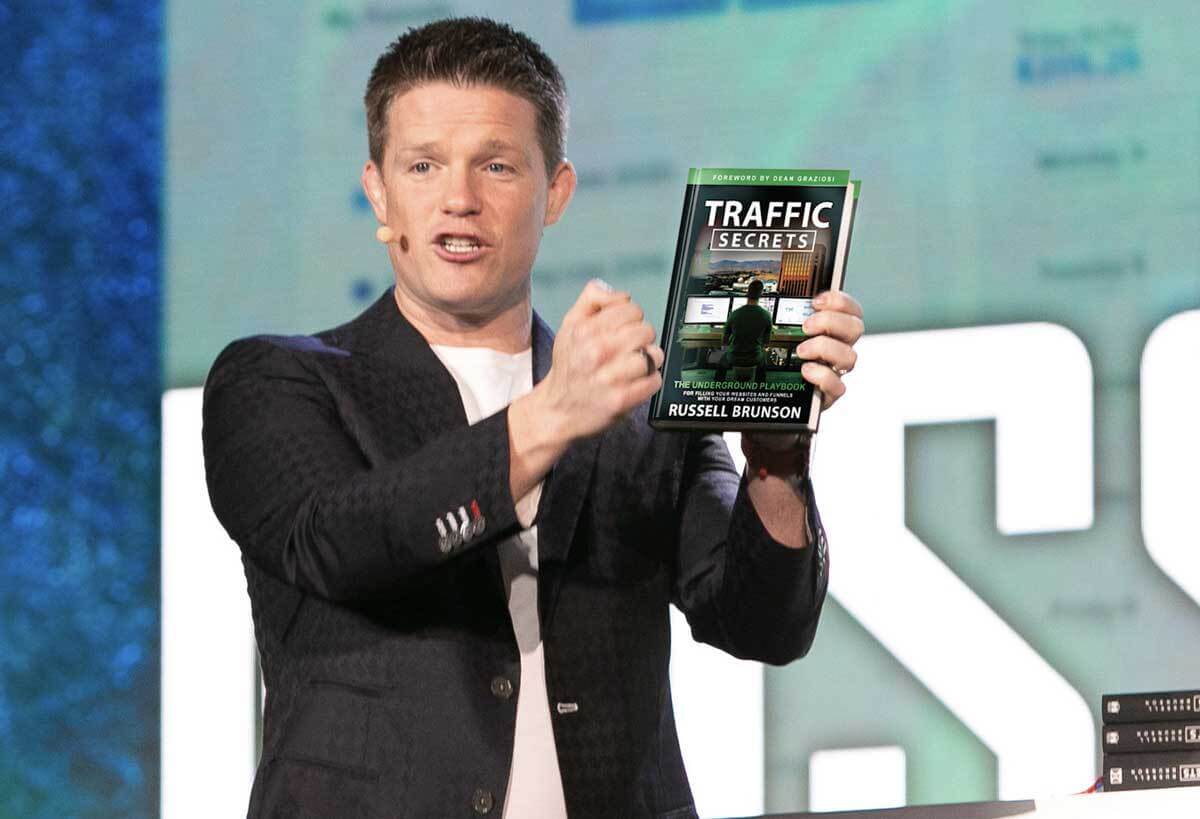 Russell-holding-Traffic-secrets